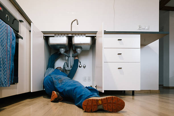Professional Drain Cleaning technician working in Tiverton, RI